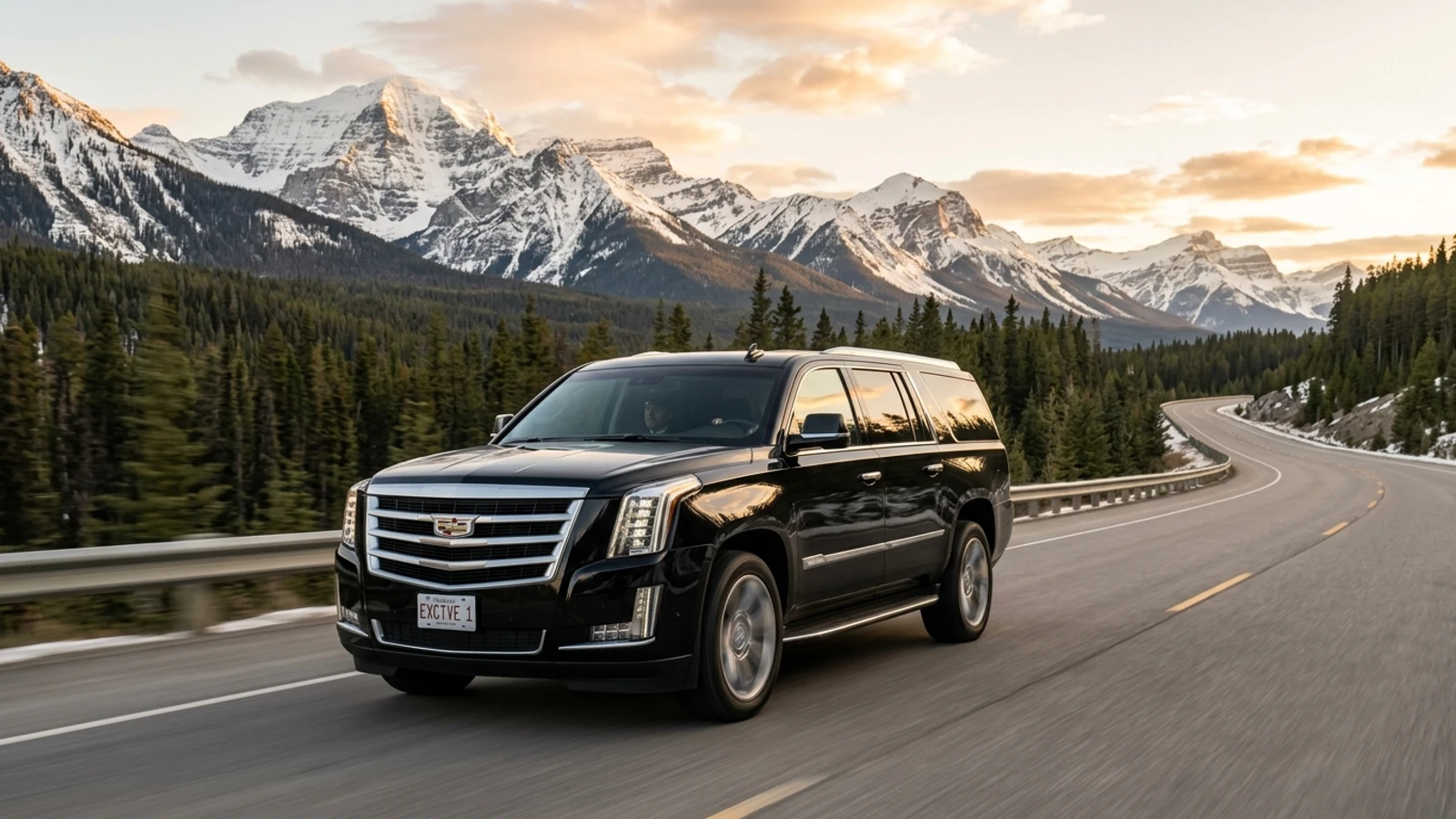 Black Chauffeurs luxury Cadillac Escalade on scenic Canadian mountain highway transfer